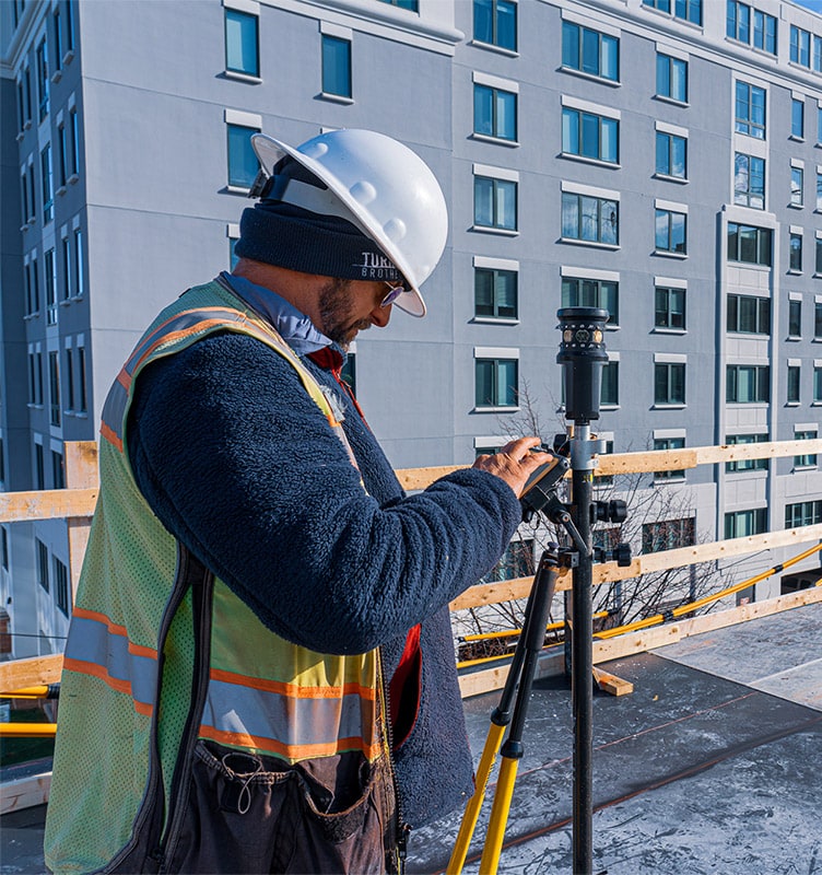 Project manager using total station