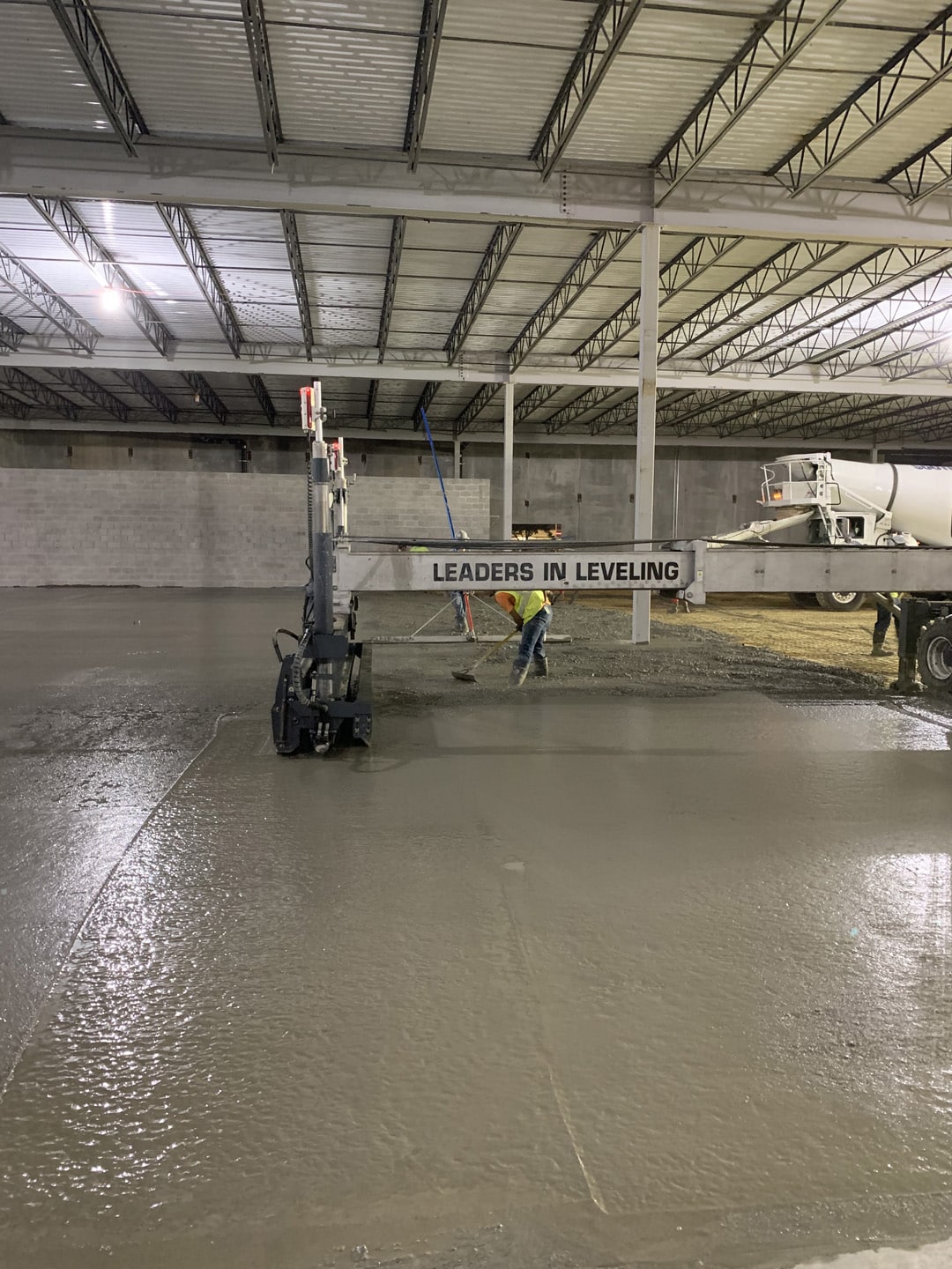 Concrete floor smoothing with laser screed